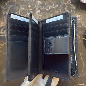 NWT. RFID wallet. 
In original box.